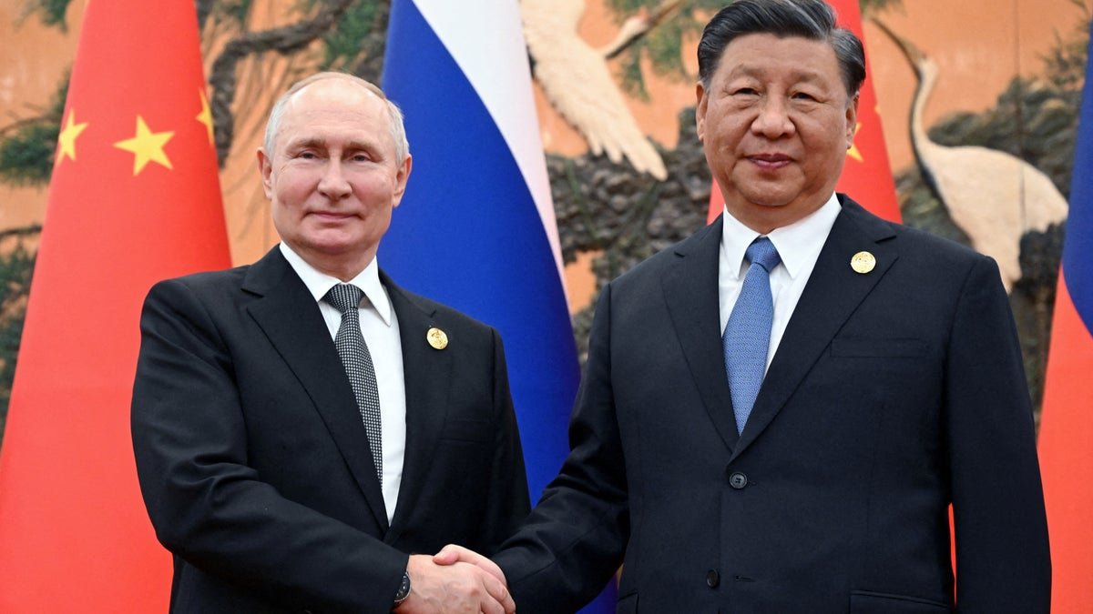 Putin shakes hands and Chefy