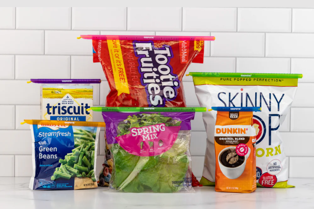 Four sealed bags on top with long plastic slices.