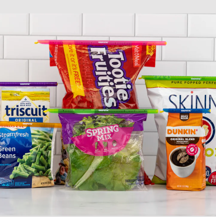 Four sealed bags on top with long plastic slices.