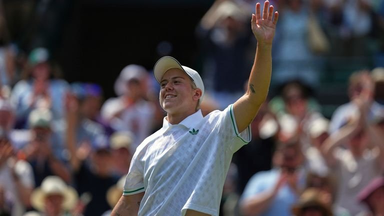 Sonay Kartal of Britain celebrates winning the women's singles third round match against Diane Parry of France at the Wimbledon Tennis Championships in London, Friday, July 4, 2025.(AP Photo/Joanna Chan)