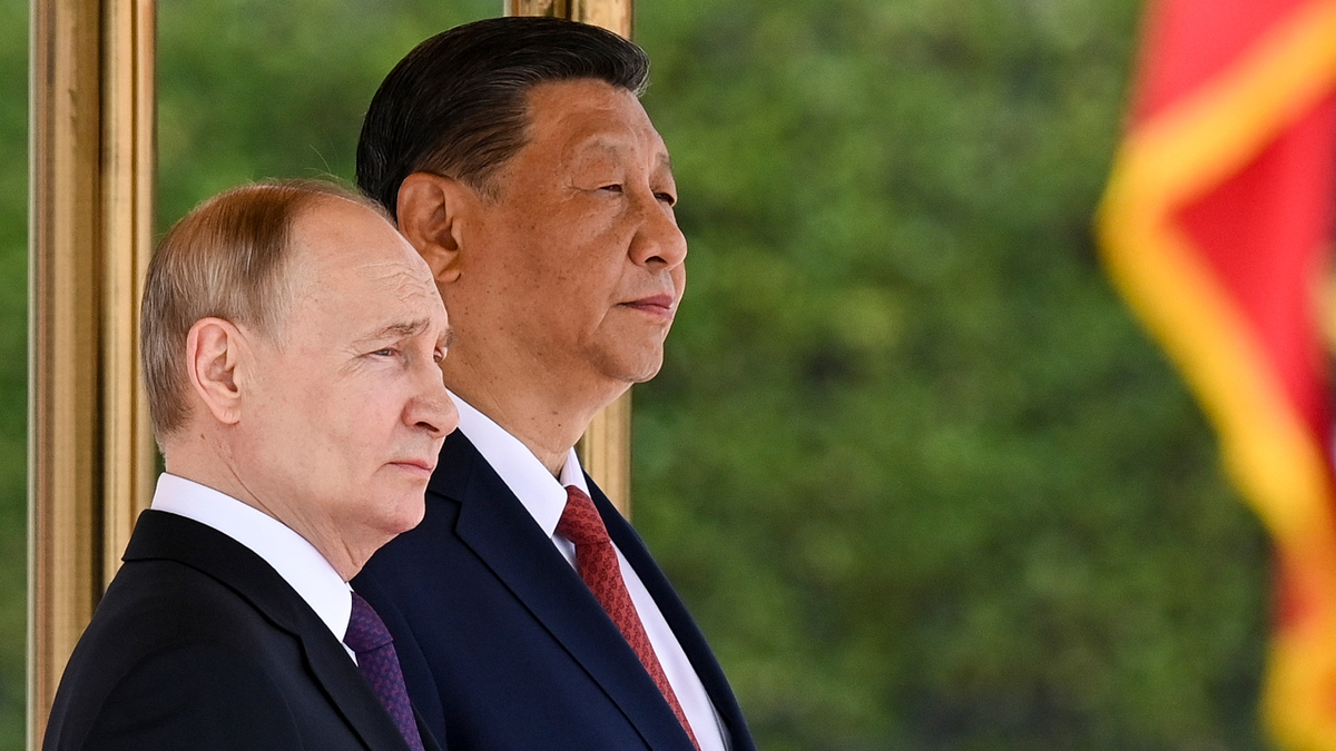 Chinese President Xi Jinping, the right, and Russian President Vladimir Putin