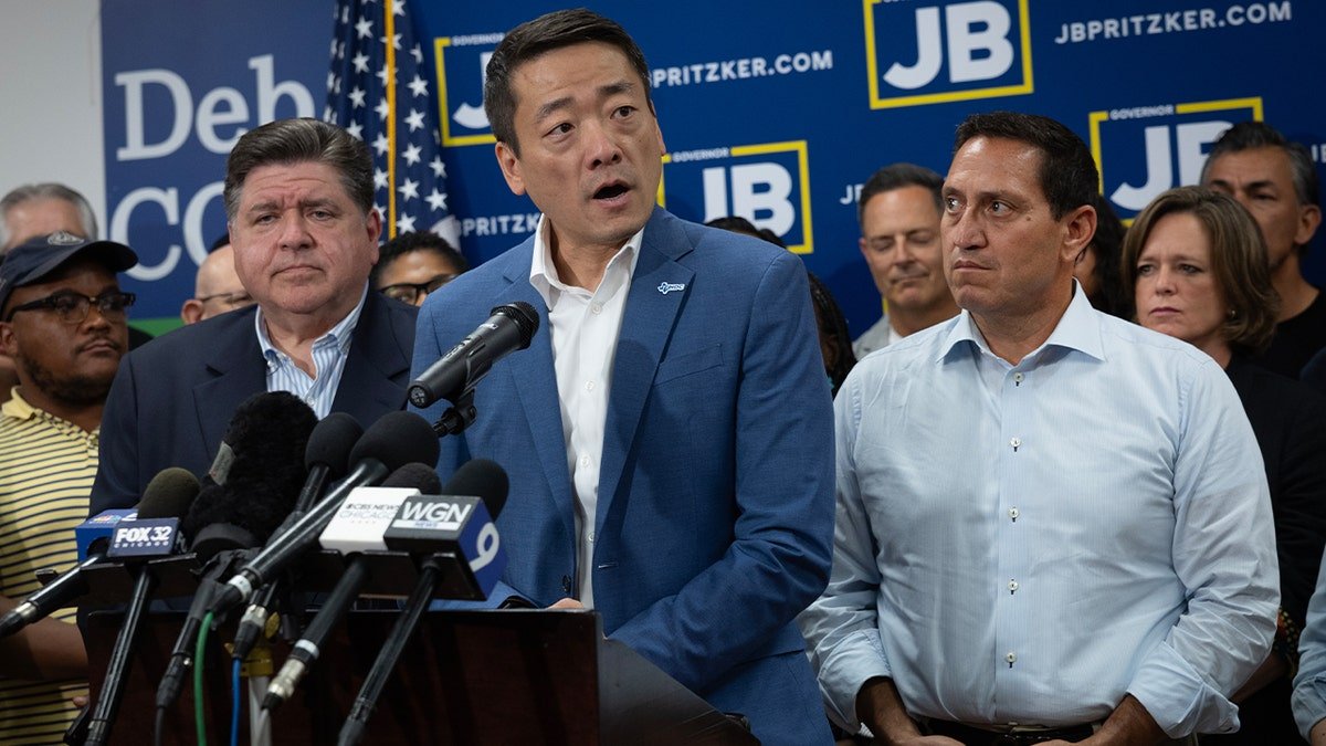 Jane Wu speaks among other legislators in Texas Deem