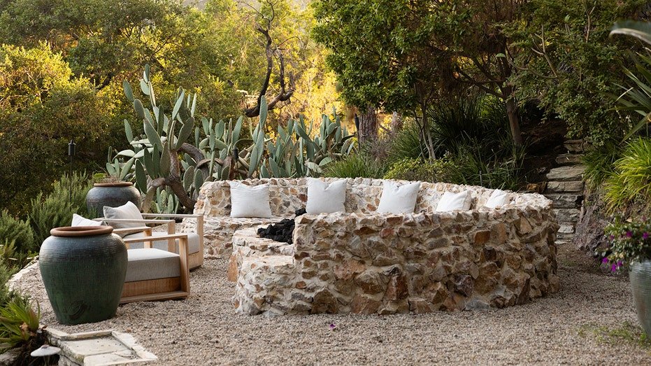 The house also includes a fire hole in the backyard.