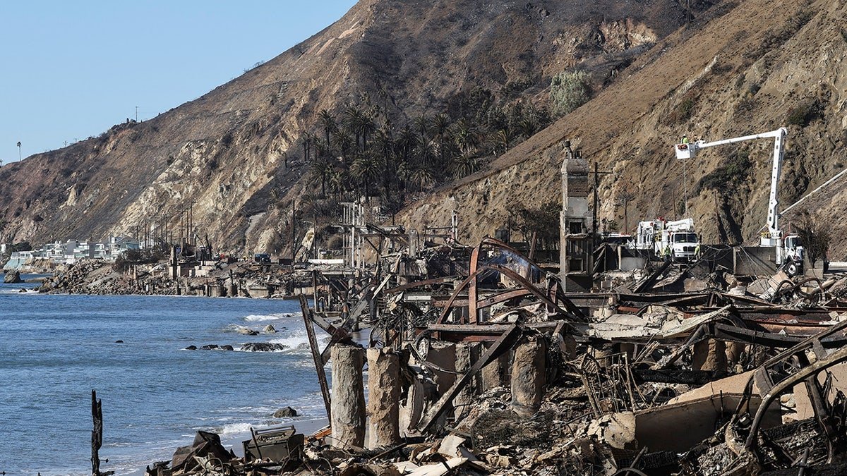 Workers replace the energy line after Palisades fire