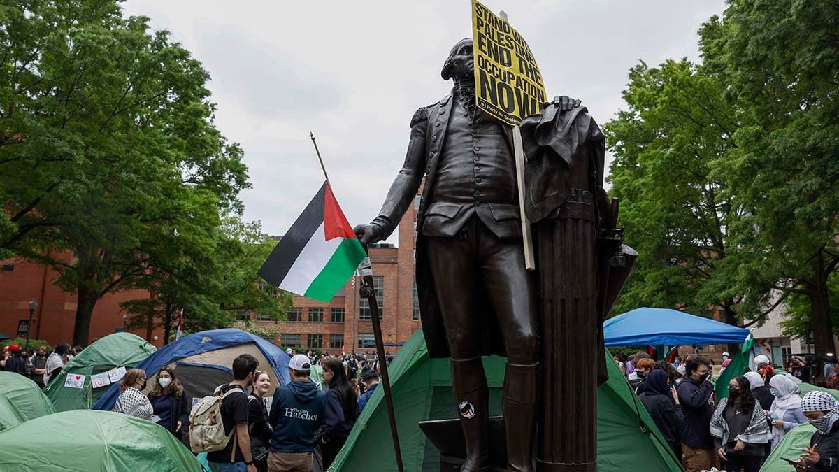 George Washington statue carries a Palestinian flag on the GWU campus