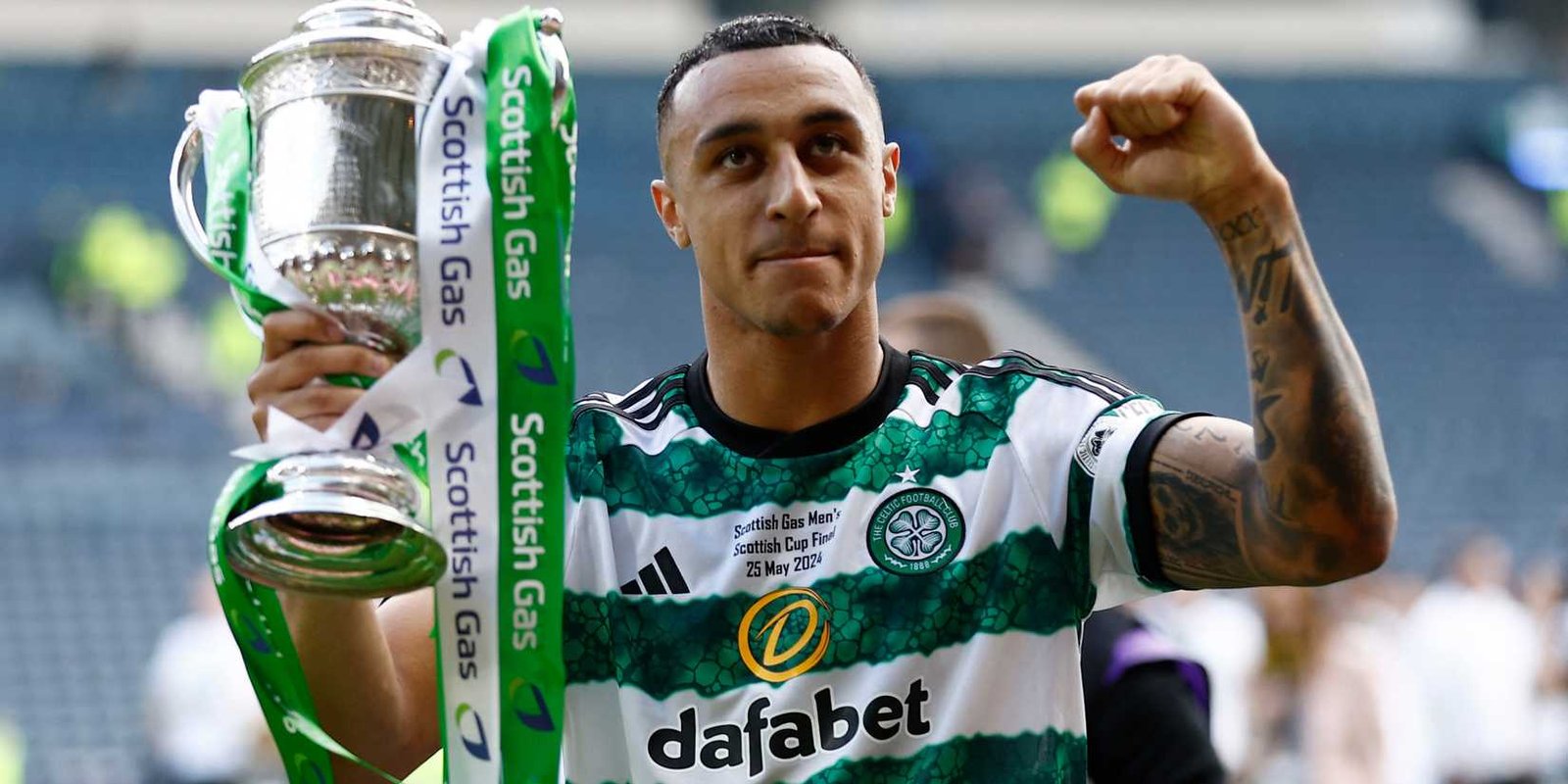 Celtic striker Adam celebrates his hands winning the Scottish Cup