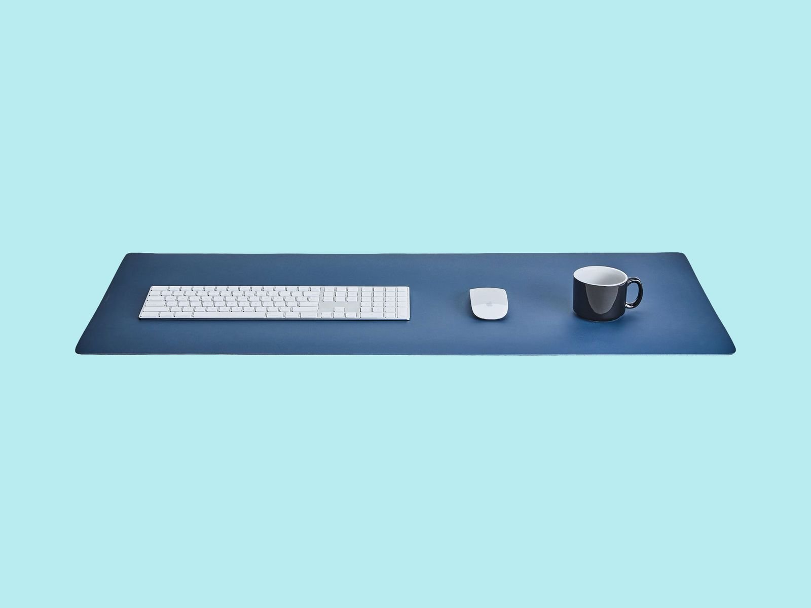 GriveMade's office board with keyboard mouse and coffee above