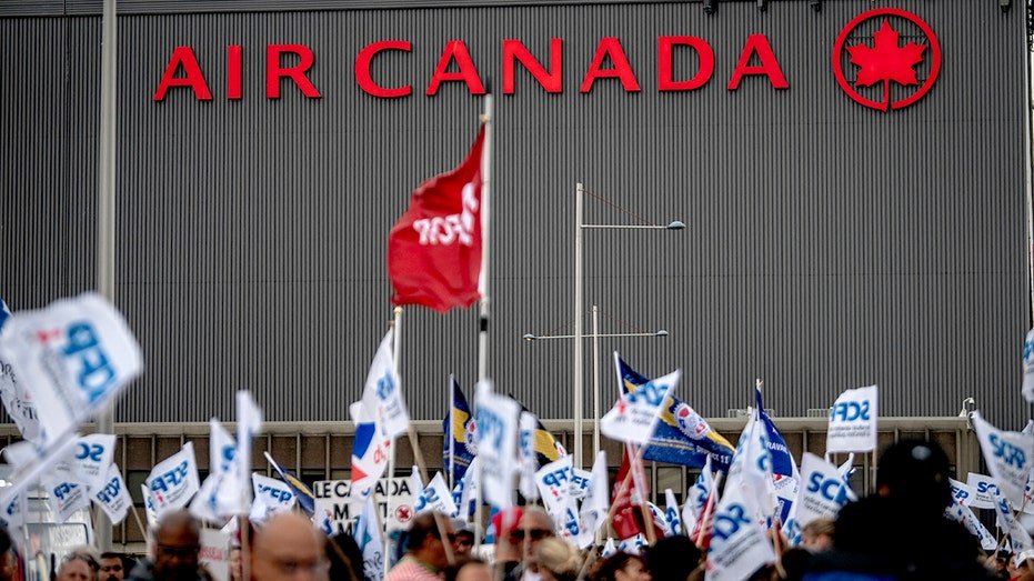 Air flight attendants are protesting in front of Air Canada headquarters near Pierre Elliotto airport in Montreal, Quebec, Canada, on August 17, 2025. 