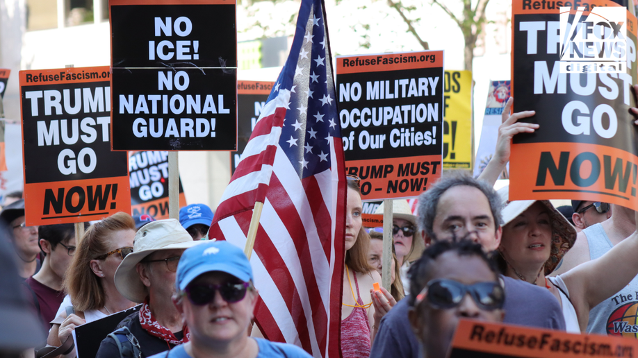 A demonstrator march in the capital against Trump