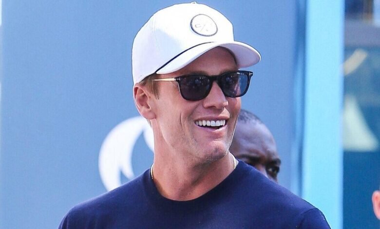 1755756108 Tom Brady Gets Trolled As Mini Me Son Jack Towers Over.jpg