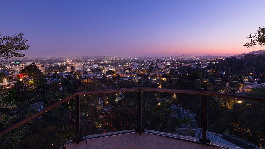 The house includes views of the city of Los Angeles and the Pacific Ocean.