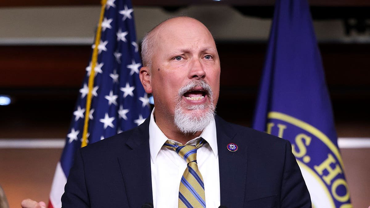 Representative Chip Roy speaks at a press conference.