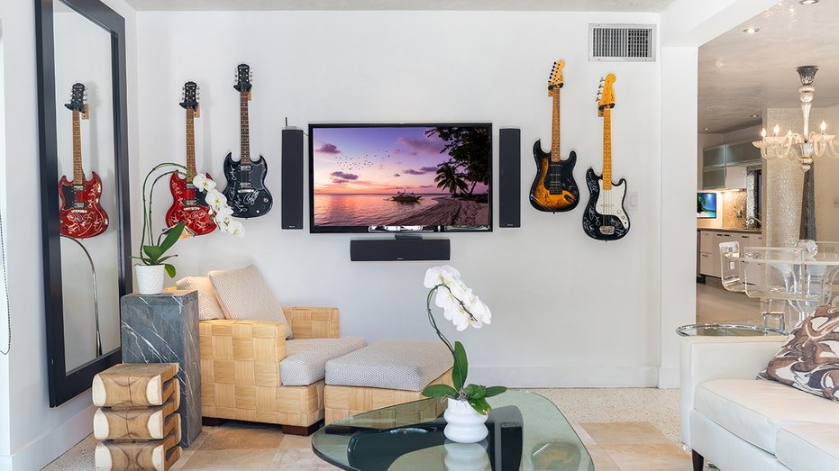 Living room with guitars on the wall