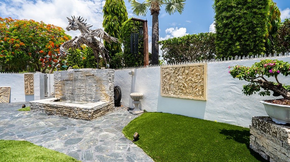 The backyard with unicorn carving