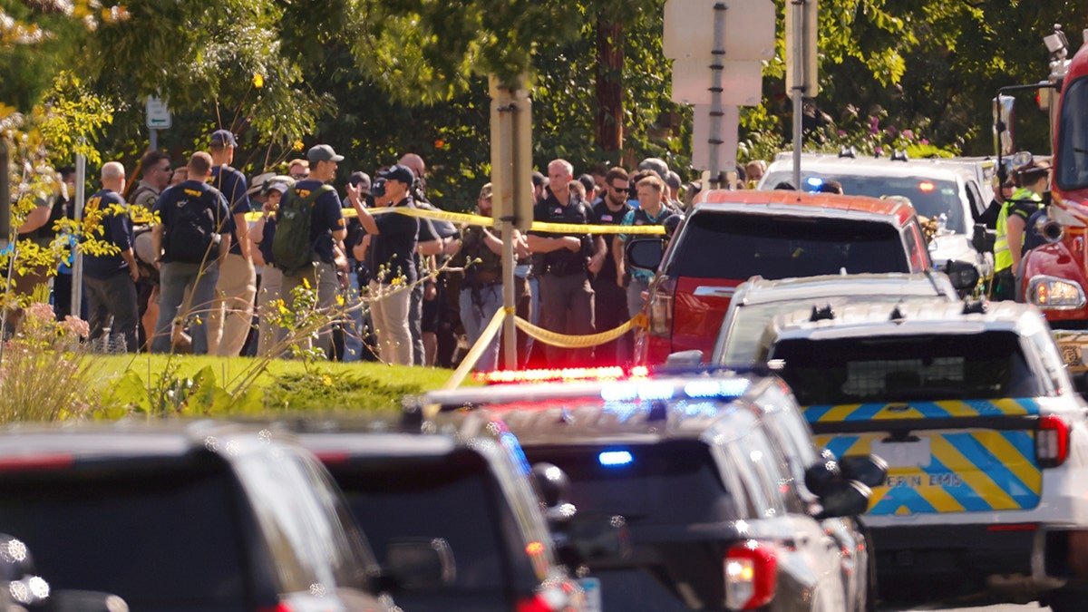 Police is outside a Catholic school after group shooting.