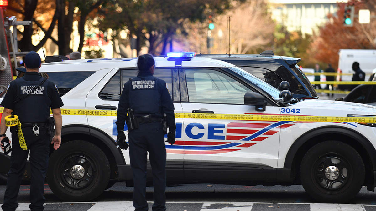 The police stand outside a periodic vehicle in the capital