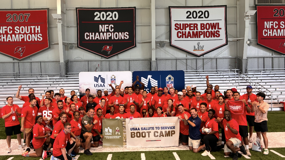 Members of the service at the USAA-NFL camp in Tampa Bay