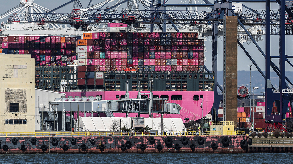The containers are accumulated on the surface of a cargo ship