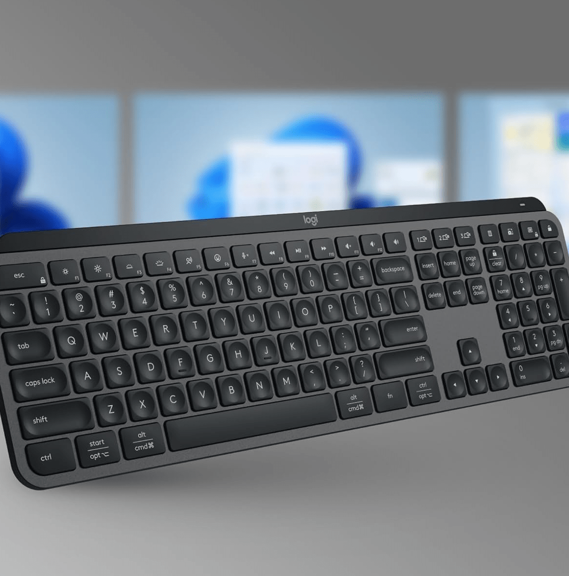 The keyboard in front of three screens