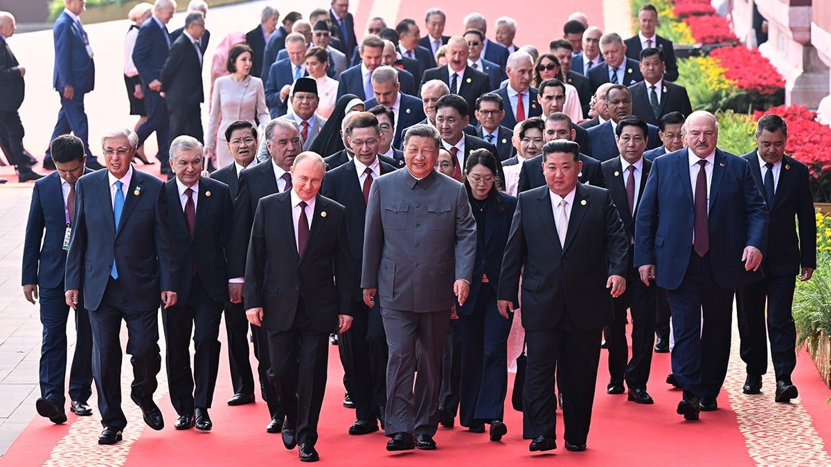 President Xi Jinping, Vladimir Putin, and Kim Jong Un in a military procession