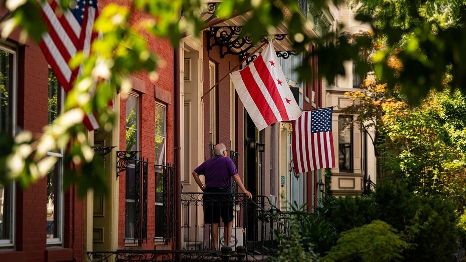 Columbia and the United States teach outside a house in the Capitol Hill neighborhood in Washington, DC,