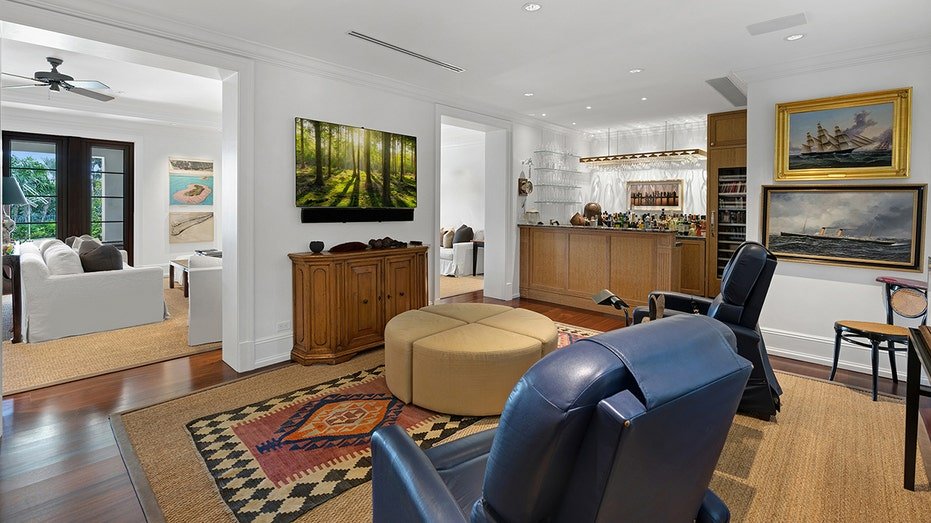 The house also includes a TV room with a fully equipped bar.