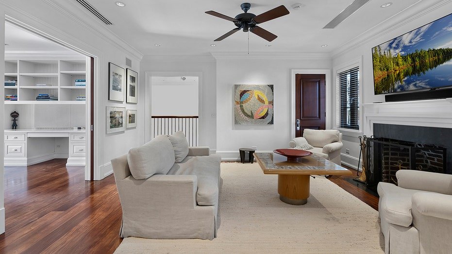 A separate TV room can be found with a fireplace elsewhere in the house.