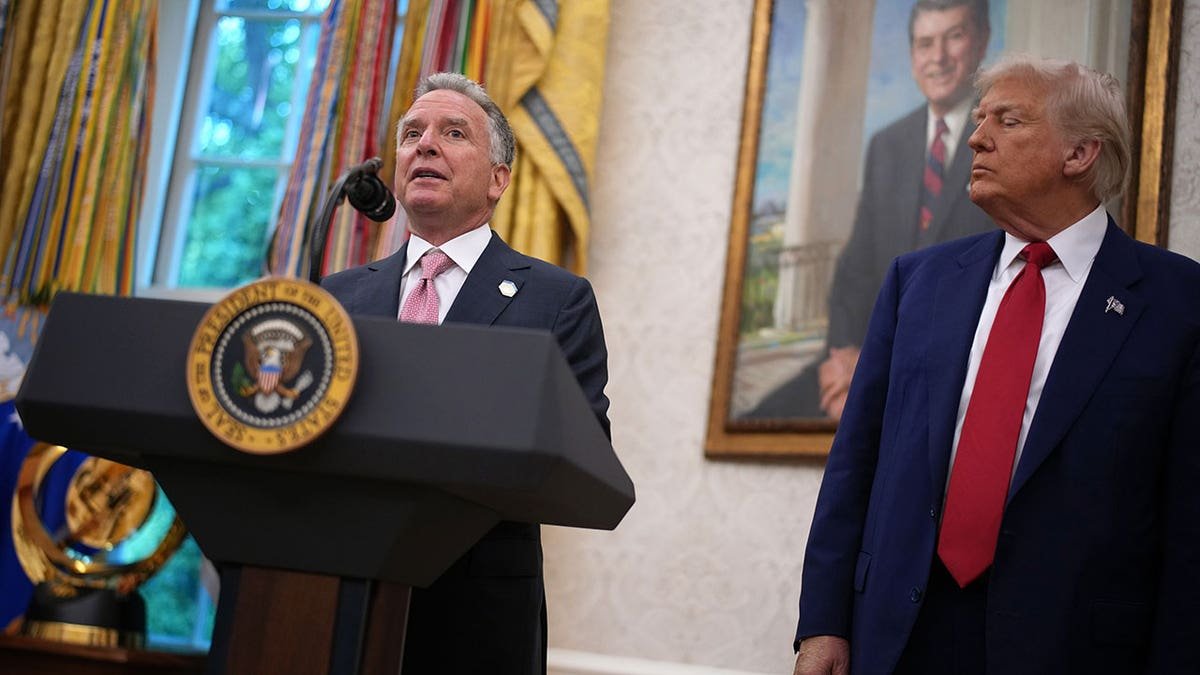 Trump and the private envoy and Yeskov meet in the Oval Office.