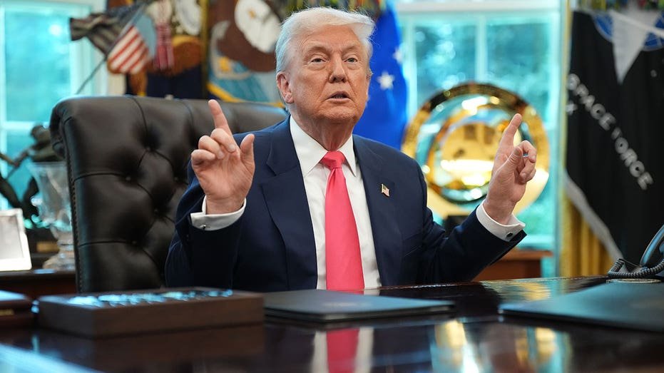 Trump answers questions from journalists at the Oval Office on August 14, 2025 in Washington, DC