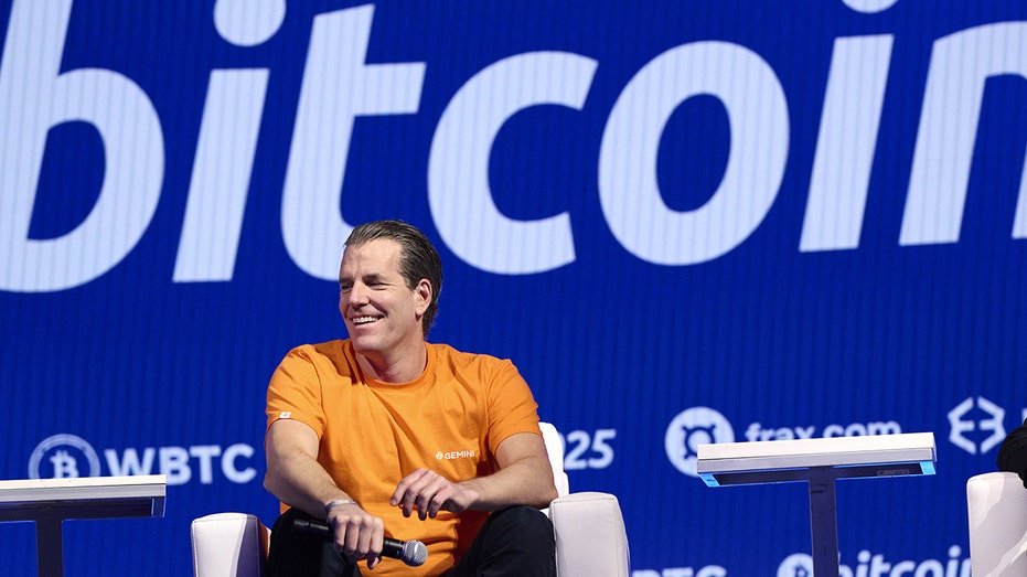 Tyler Winkefus, co -founder of Gemini, with Brother Cameron