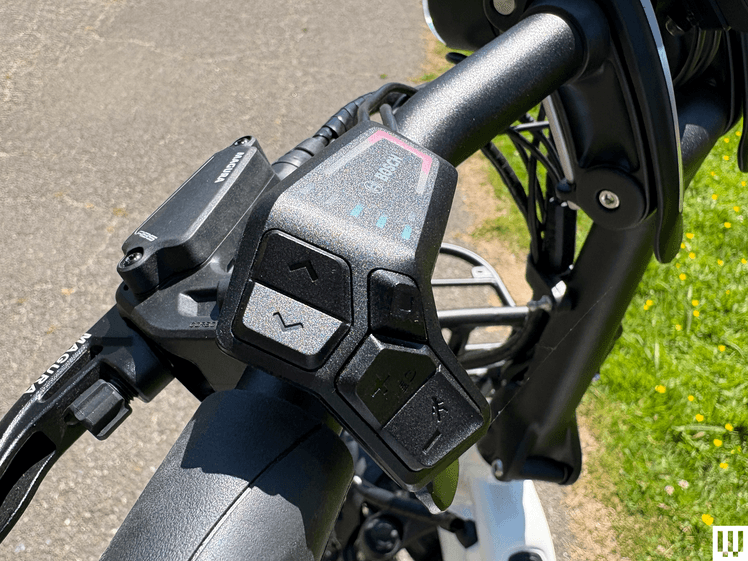 The image may contain: motorcycle, transportation, vehicle, and electronics