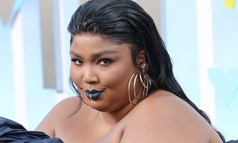 1757849461 Lizzo Flaunts Slimmer Figure In Sheer Ensemble At Fashion Show.jpg