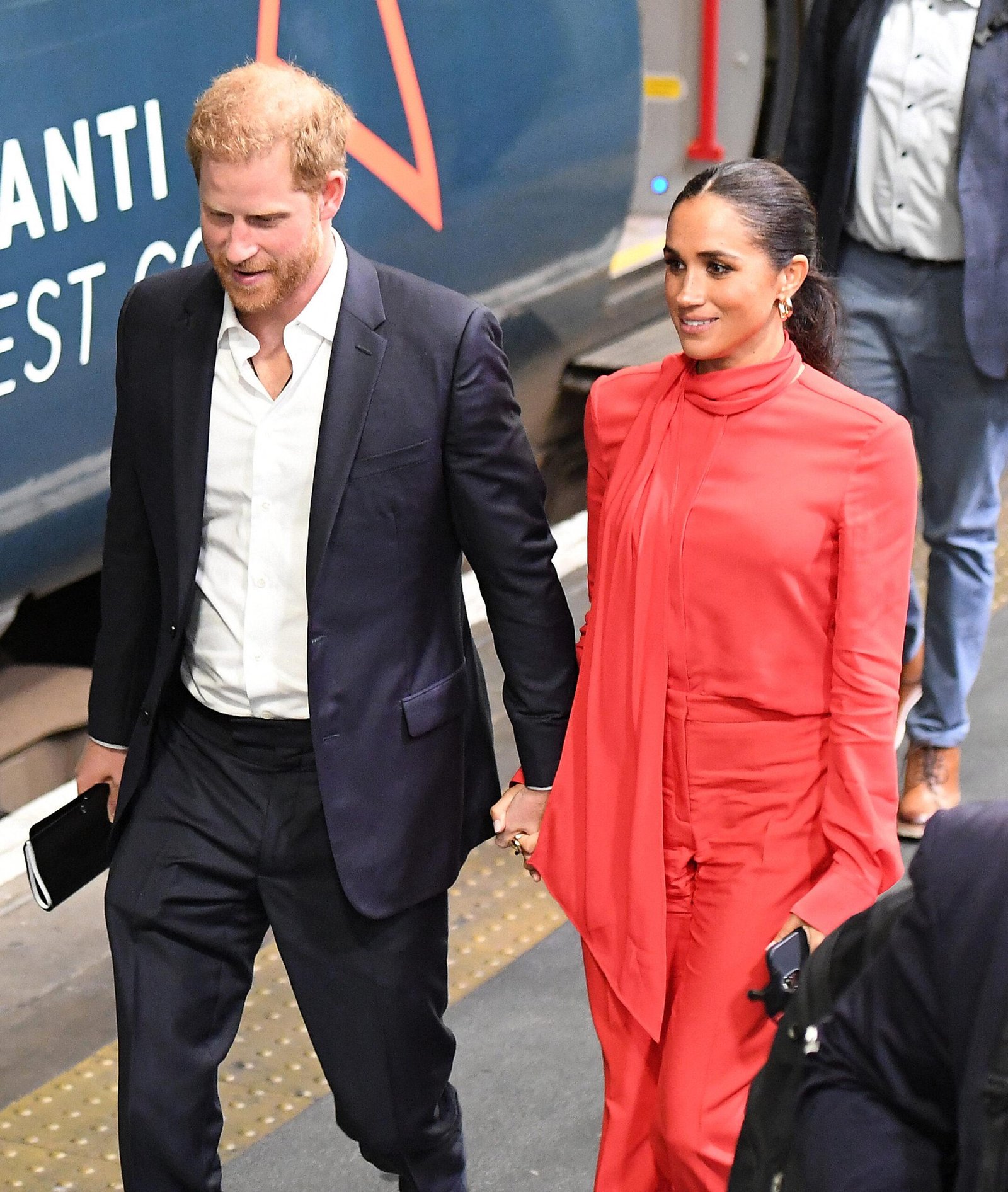 Prince Harry and Meghan Markle at Juston Station on a train from Manchester, after they attended the one -young world summit