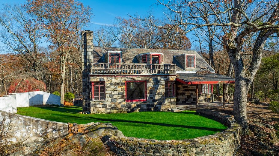 The lands also feature a stone colonial home.