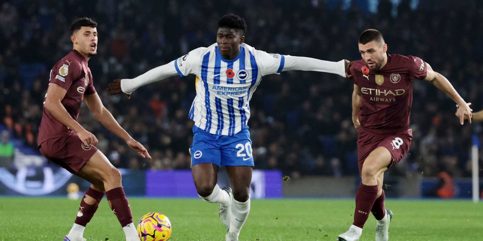 Brighton & Hove Albion's Carlos Baleba at Mateo Kovacic from Manchester City