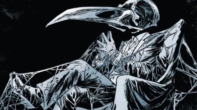 Ghongo sits covered with threads in the moon