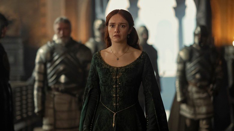 Will you look terrified in her green dress while she was walking in the hallway at the dragon house