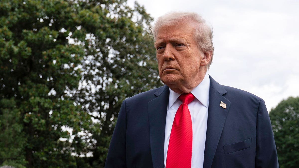 Trump speaks to journalists at the White House