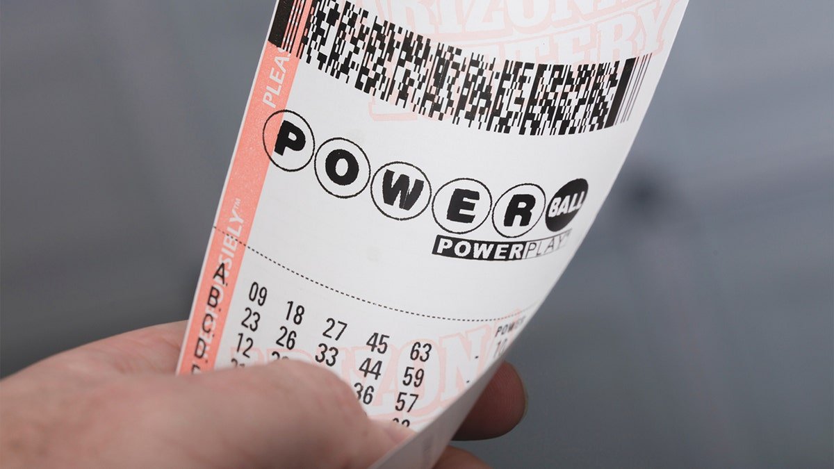 The person sees a printed PowerBall.