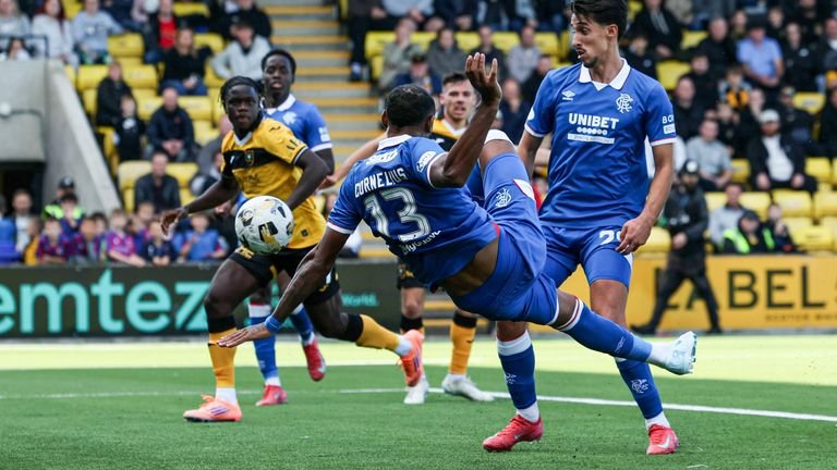 Derek Cornellius from Rangers deals with the ball before scoring a goal that excludes his goal later after the VAR examination