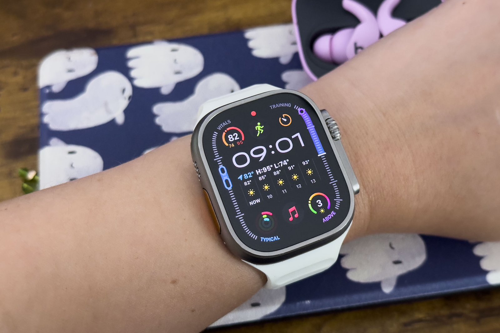 An close to someone wearing Apple Watch Ultra 2 with Watchos 11
