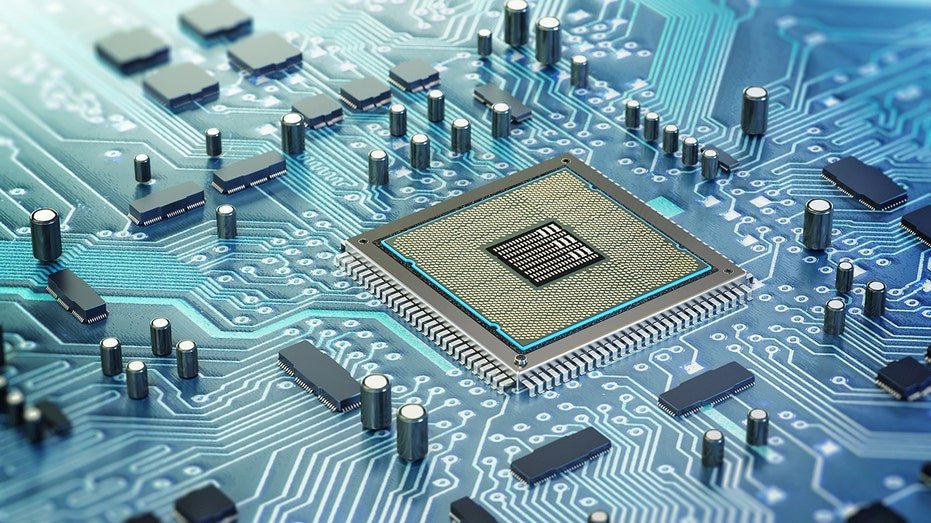 A detailed structure for computer cardiac sheems located on the circuit board. The surrounding electronic components highlight the complexity and innovation of modern technology
