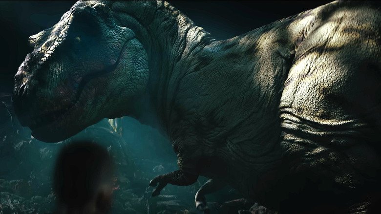 He turns T-RX to show his head in the primitive war