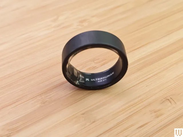 The image may contain: accessories, jewelry, ring and tape