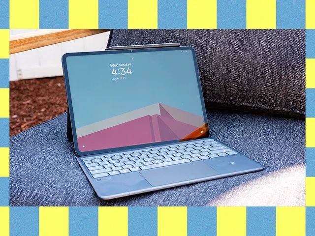 The image may have: computer, electronics, laptop, personal computer, tablet, computers, devices, and computer keyboard