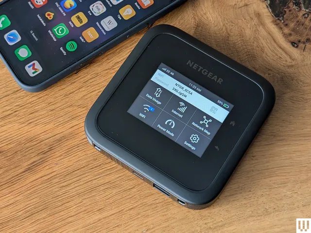 The image may contain: electronics, mobile phone, phone and computer