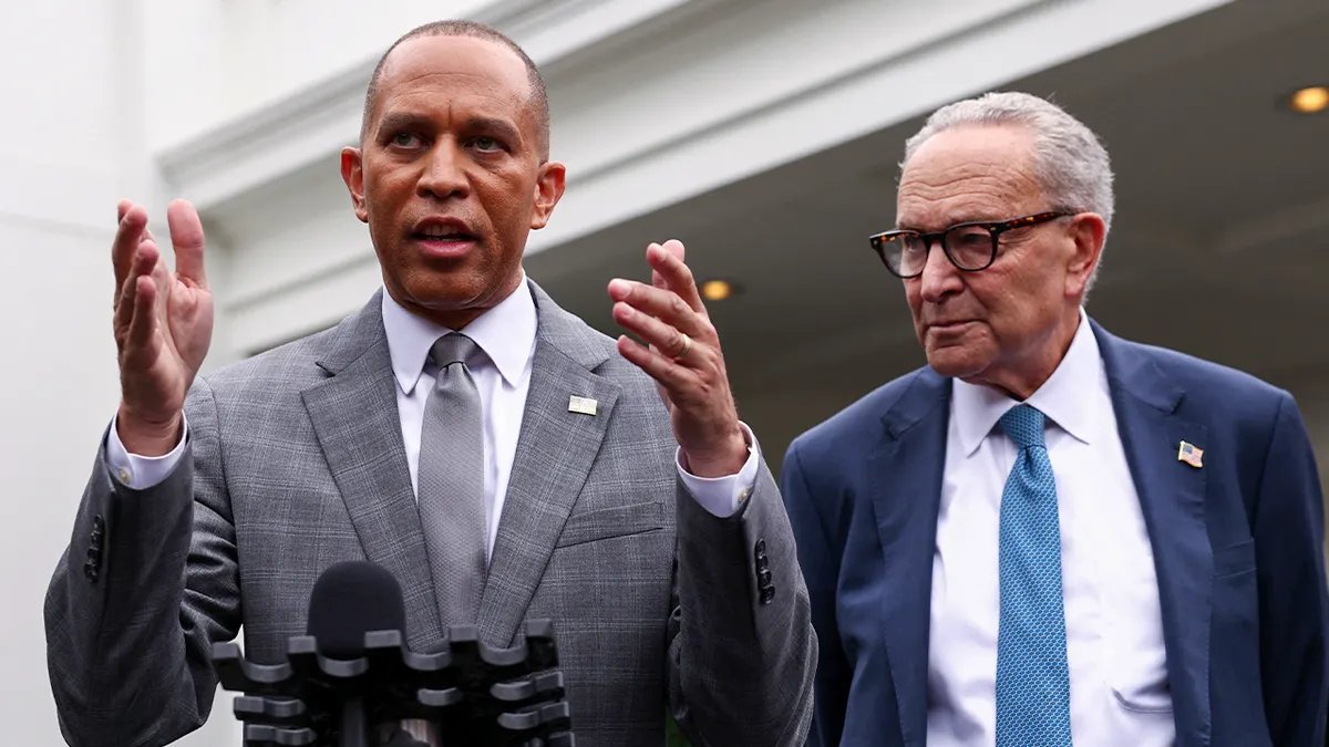 Hakim Jeffrez and Chuck Schumer are talking to the media