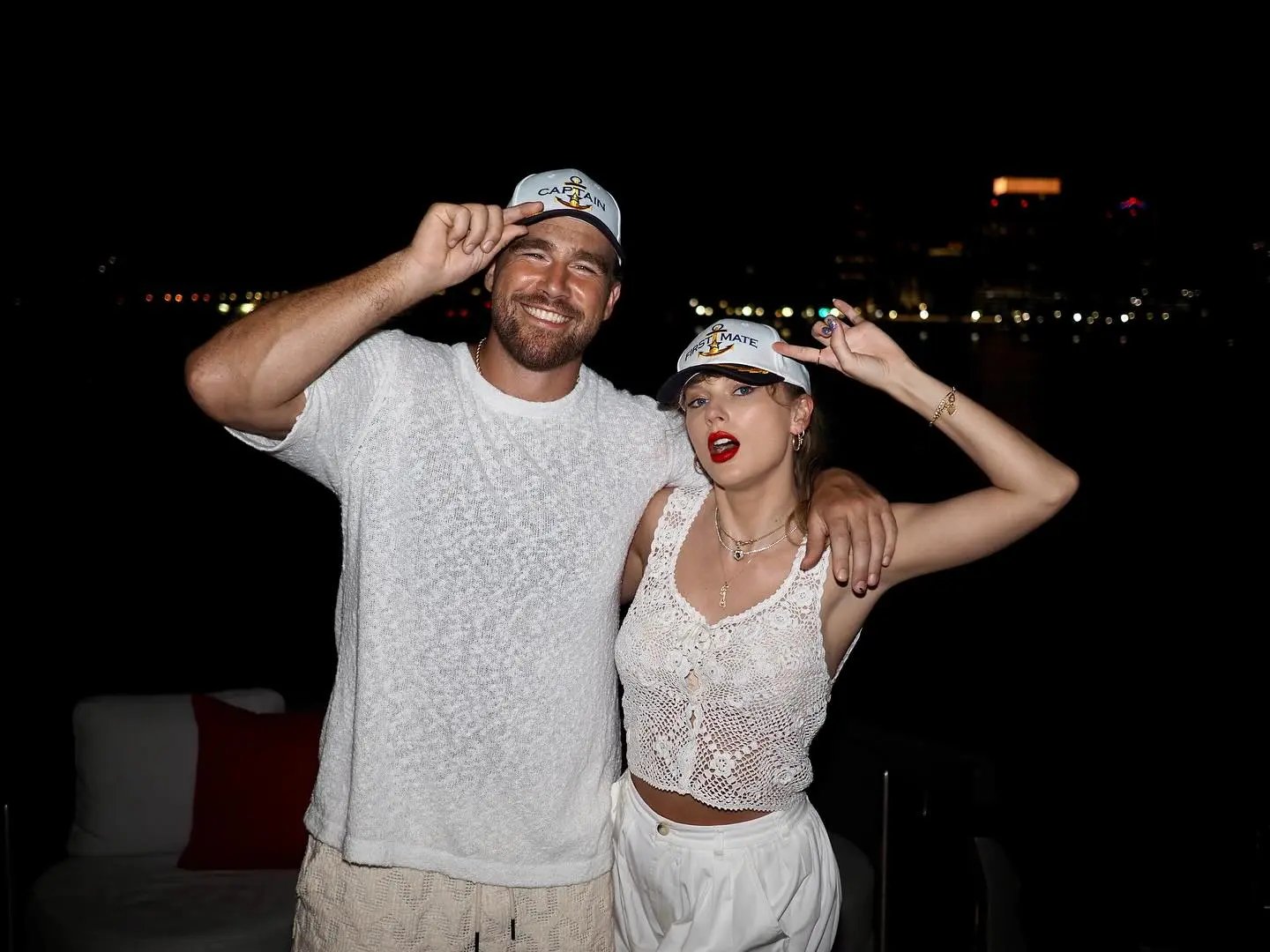 Travis Kelos is raised with Taylor Swift