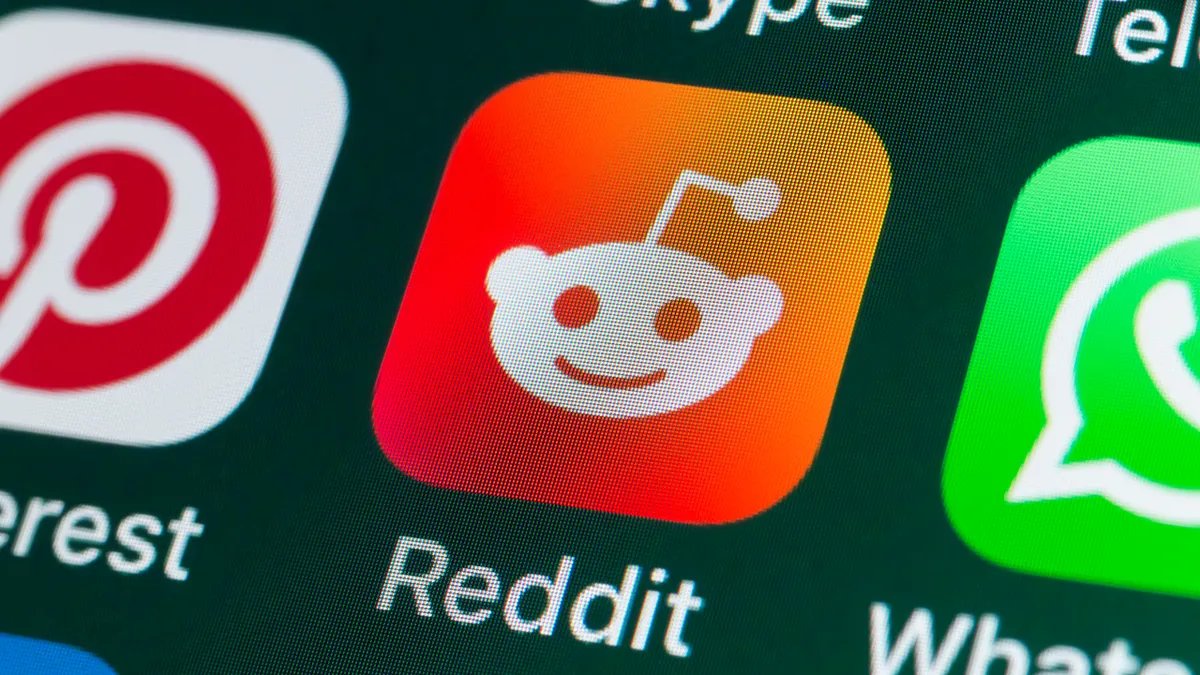 The Reddit app logo appears on iPhone next to the Pinterest and WhatsApp logos