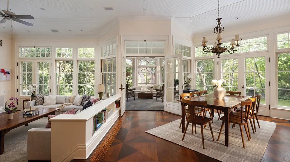Connecting to the kitchen is the informal dining area, family room and sunroom.